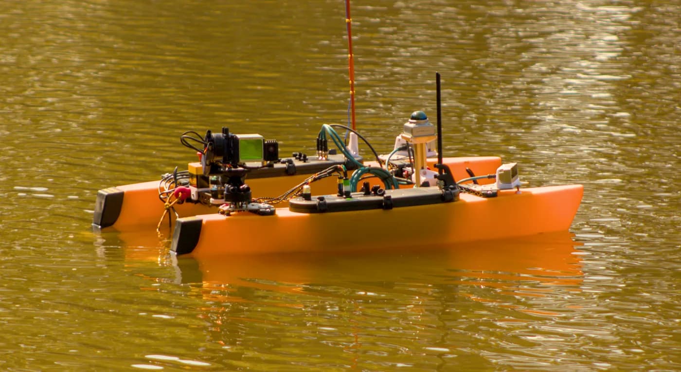 The surface vehicle's catamaran hull on the lake
