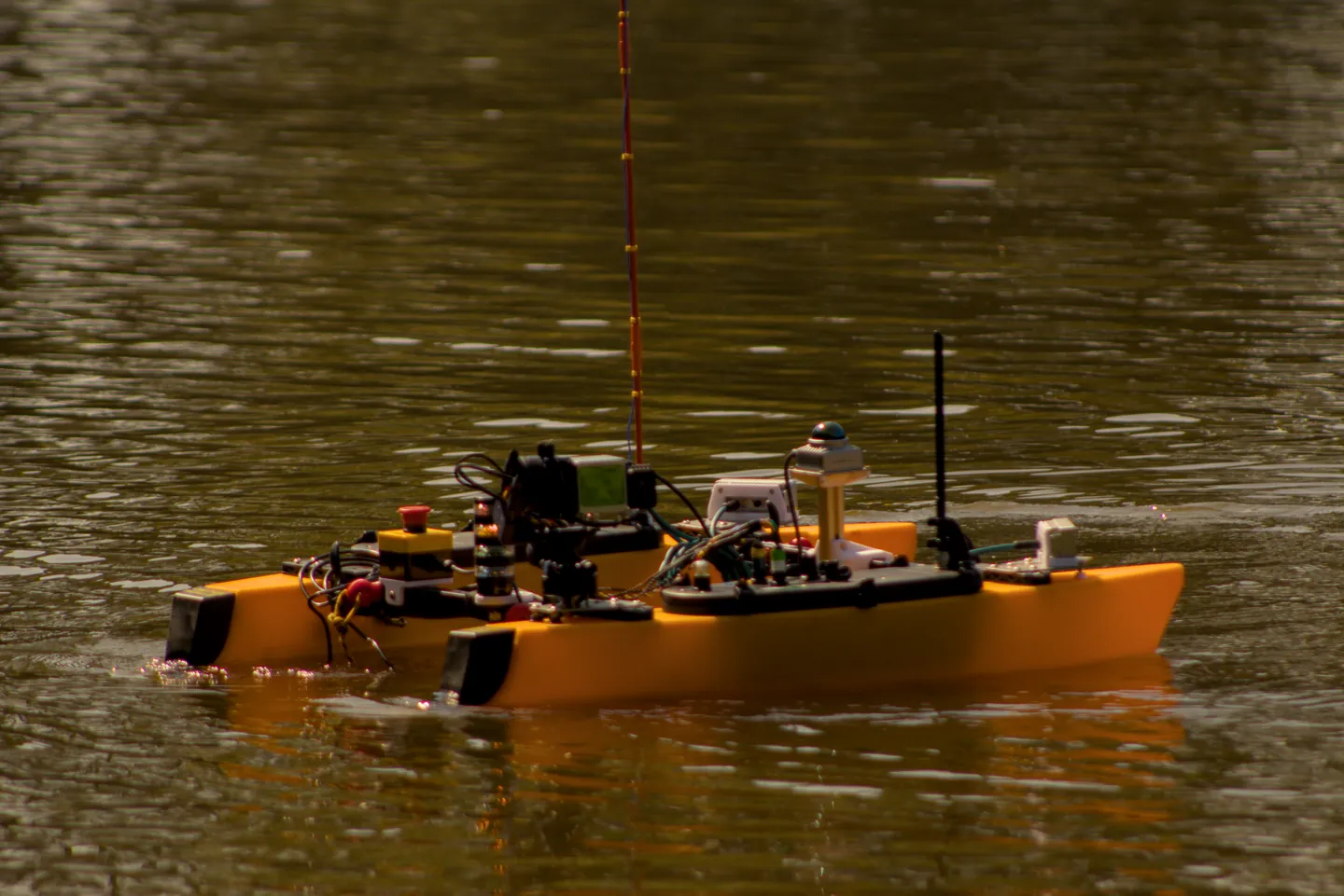 RobotX surface vehicle equipped with sensors during on-water testing